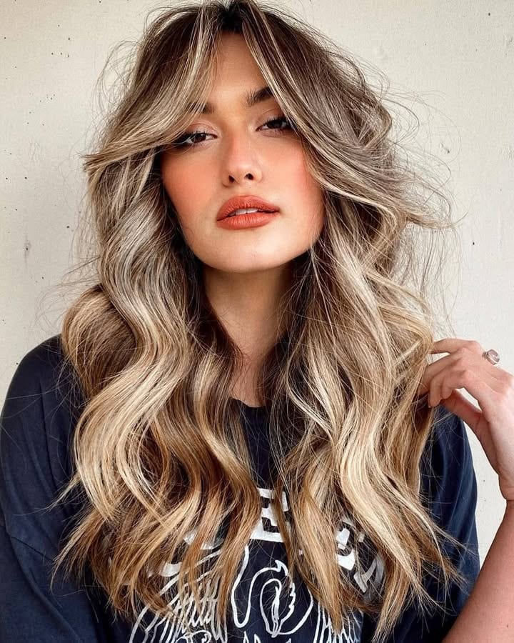 How To Style Curtain Bangs: 21 Easy Ways That Work 5 Add a Soft Wave with a Curling Wand