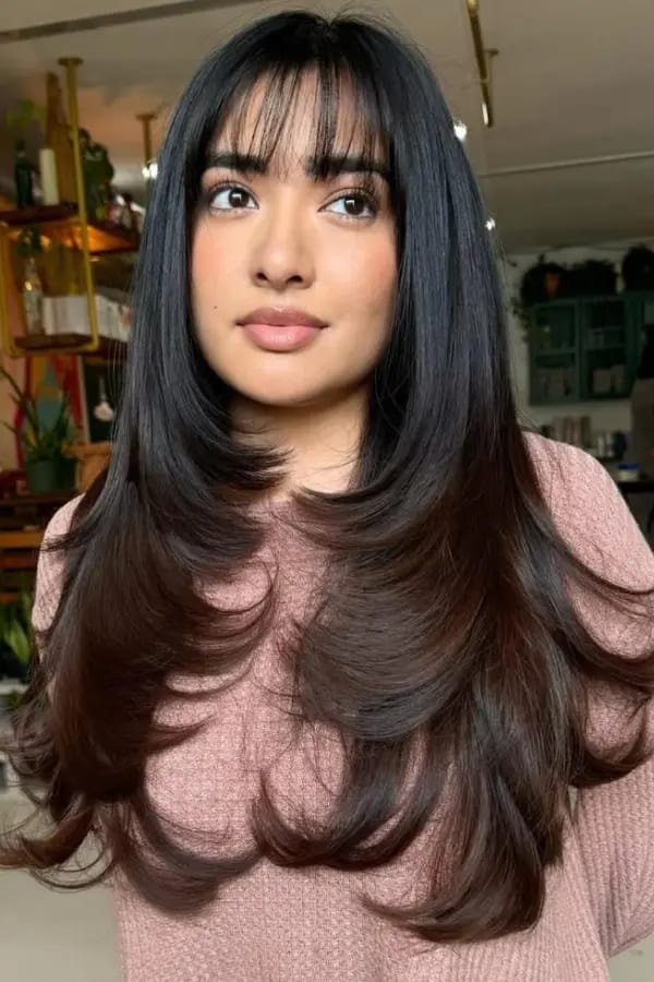 Curtain Bangs With a Sleek Blowout