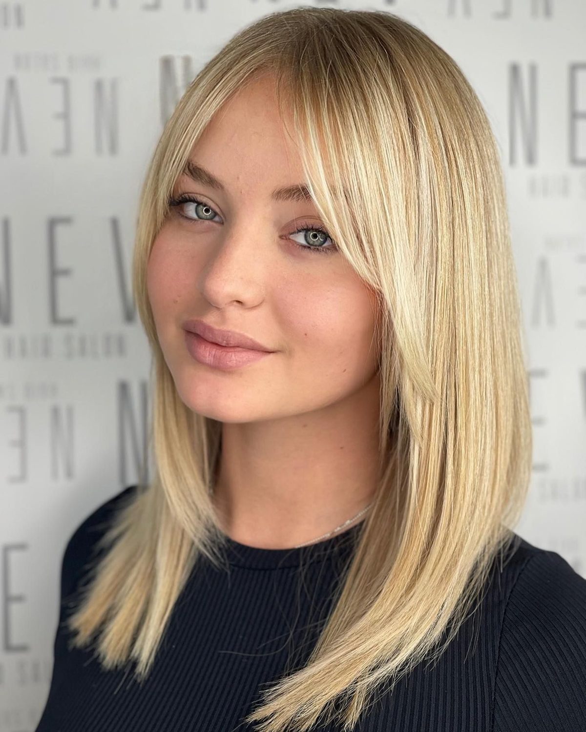Curtain Bangs With a Sleek Straight Style
