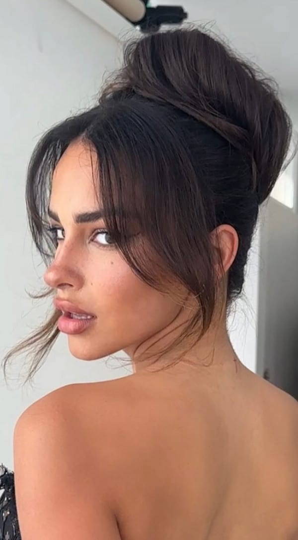 Wispy Curtain Bangs With a Tousled Updo