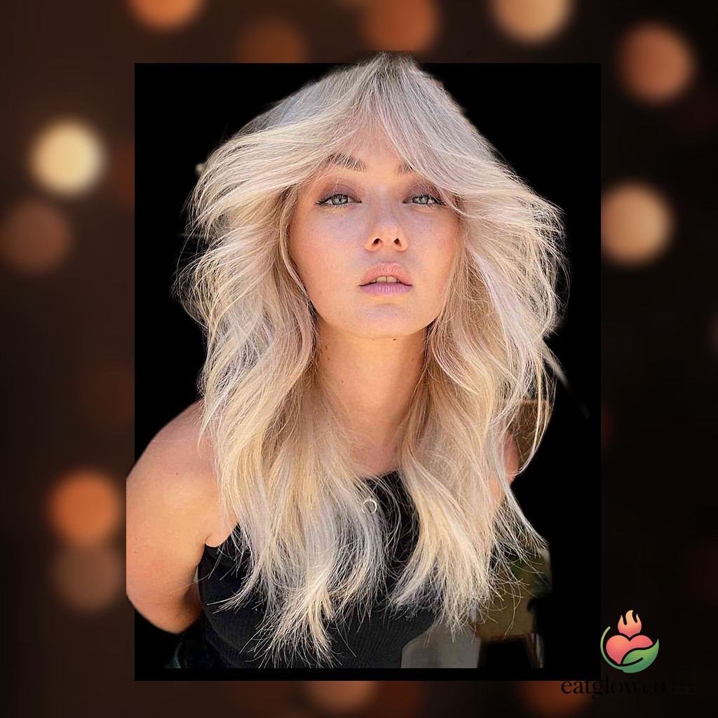 21 Curtain Bangs Hairstyle Ideas That Actually Look Good 9 Bright Creamy Blonde Blowout