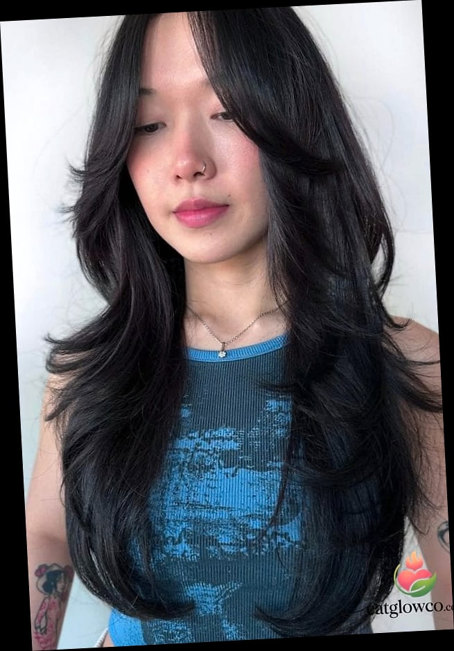 Wolf Cut For Women: 11 Trendy Looks To Ask Your Stylist 3 Wolf Cut With Curtain Bangs